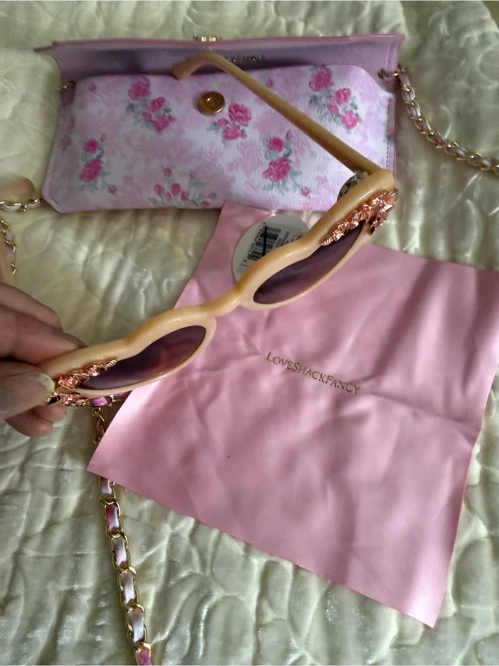 LoveShackFancy pink peach heart sunglasses with rose-gold floral embellishment